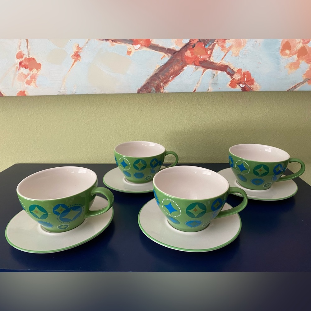 Set of 4 Starbucks cups and saucers holiday 2006 (k)